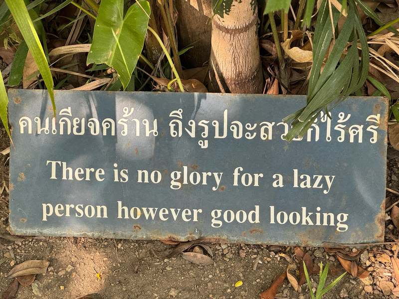 Sign explaining “There is no glory for a lazy person however good looking”