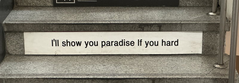 Stair label explaing that “I’ll show you paradise if you hard”